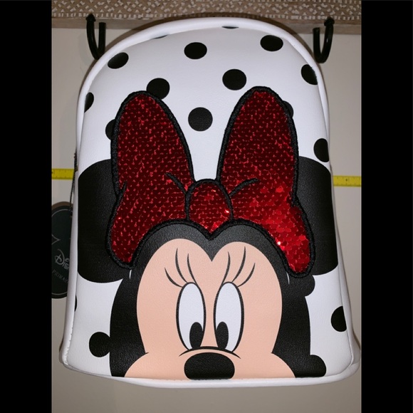 Disney Handbags - NWT White Minnie reversible sequin mini backpack